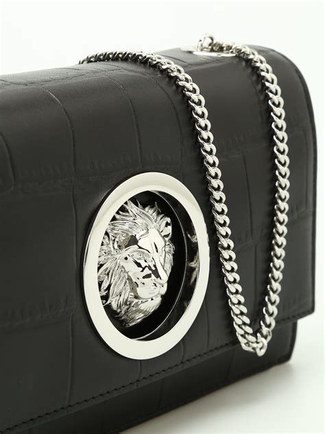 versus versace lion head leather clutch bag|VERSUS Versace Leather Clutch/ Crossbody Bag .